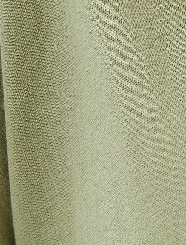   Tricou scurt din bumbac slim fit, cu detalii de corset, cu mânecă trei-sferturi, guler rotund, imprimat