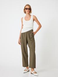 Pantaloni Carrot cu Talie Elastică și Buzunare